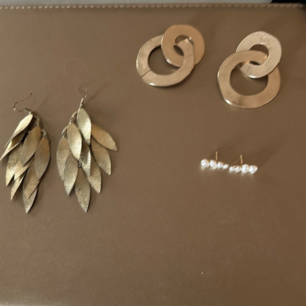 Three sets of earrings